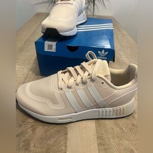 Adidas neutral tan sneaker originals size 6 but fit more like a women’s 7.